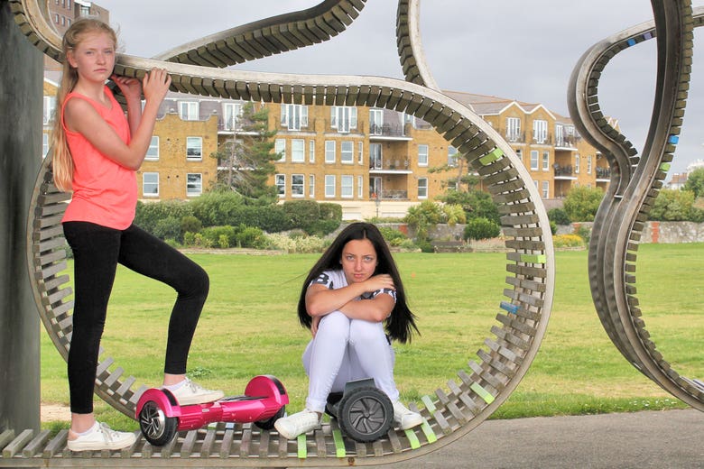 Hoverboards with two teenage models for Bluefin Trading
