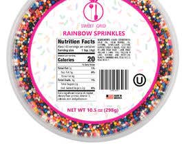 #9 untuk Design a 3&#039;&#039; circular label for our sprinkles line -RAINBOW SPRINKLES oleh Shubho87